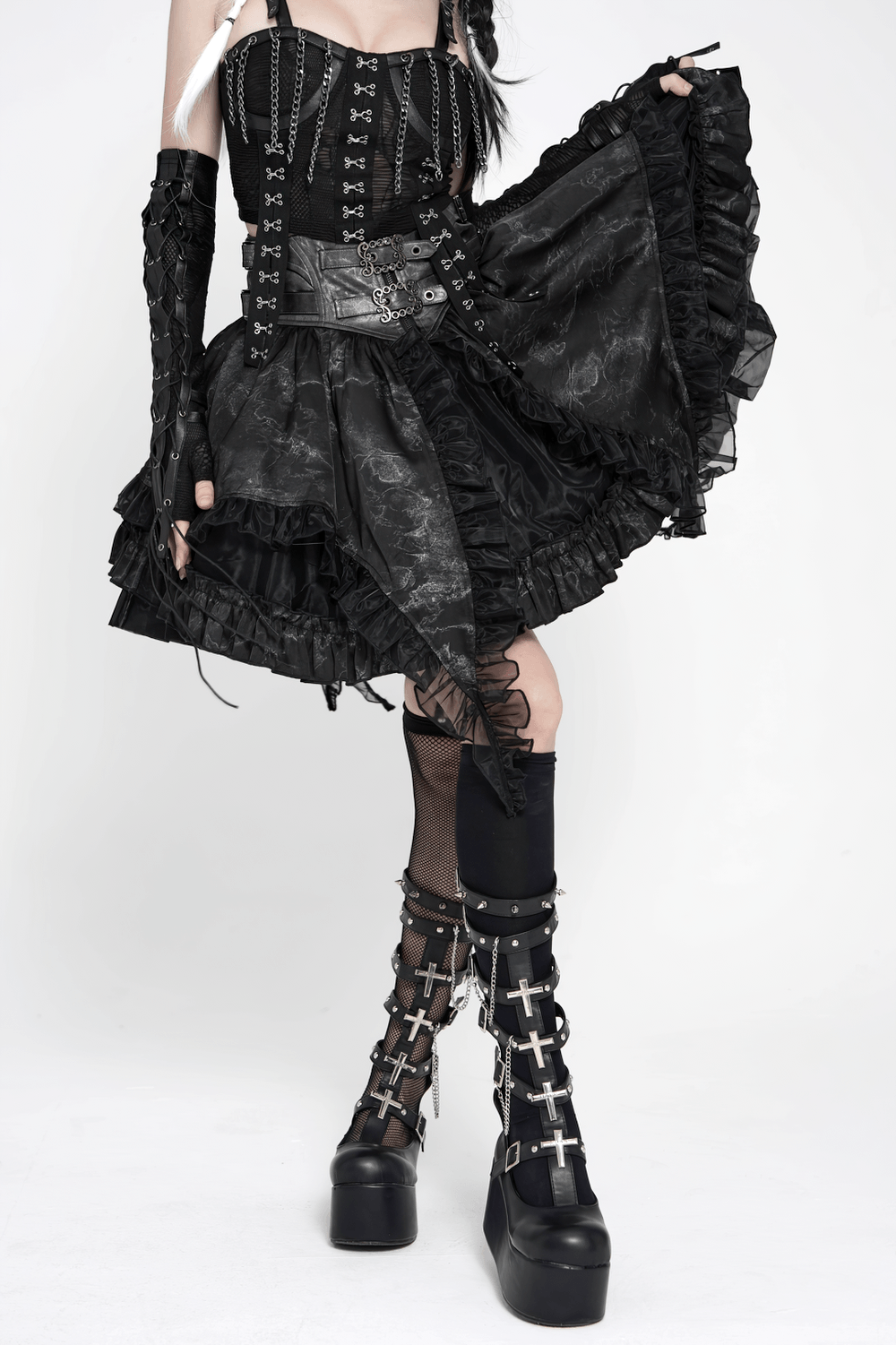 Black Gothic Corset Ruffle Mini Skirt with Chains showcased with layered ruffles and lace-up waist detail.