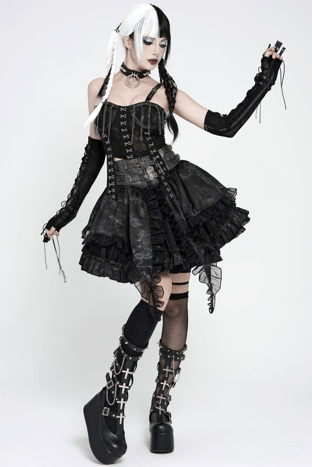 Black Gothic Corset Ruffle Mini Skirt with Chains worn by a model in layered punk lolita style with dramatic accessories.