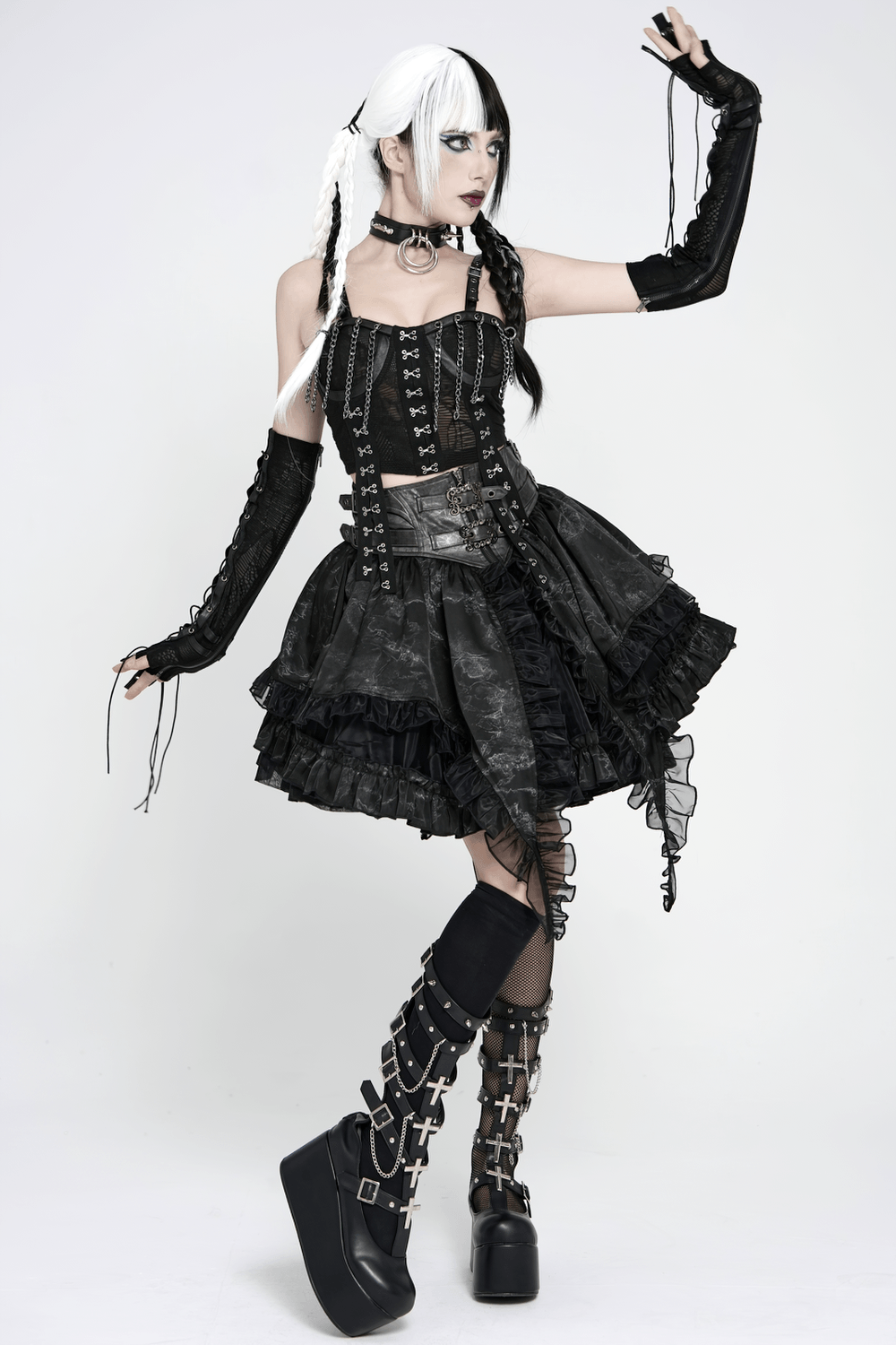 Black Gothic Corset Ruffle Mini Skirt with Chains worn by a model featuring lace-up details and layered ruffles.