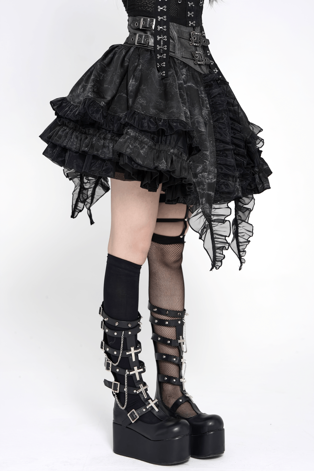 Black Gothic Corset Ruffle Mini Skirt with Chains worn with edgy platform boots and layered stockings.