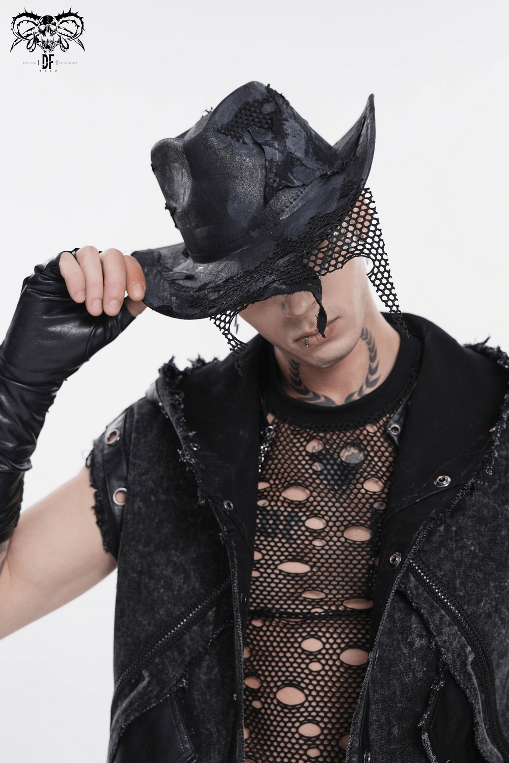 Black Gothic Cowboy Hat with Distressed Mesh Patch Details worn by a model in a stylish outfit.