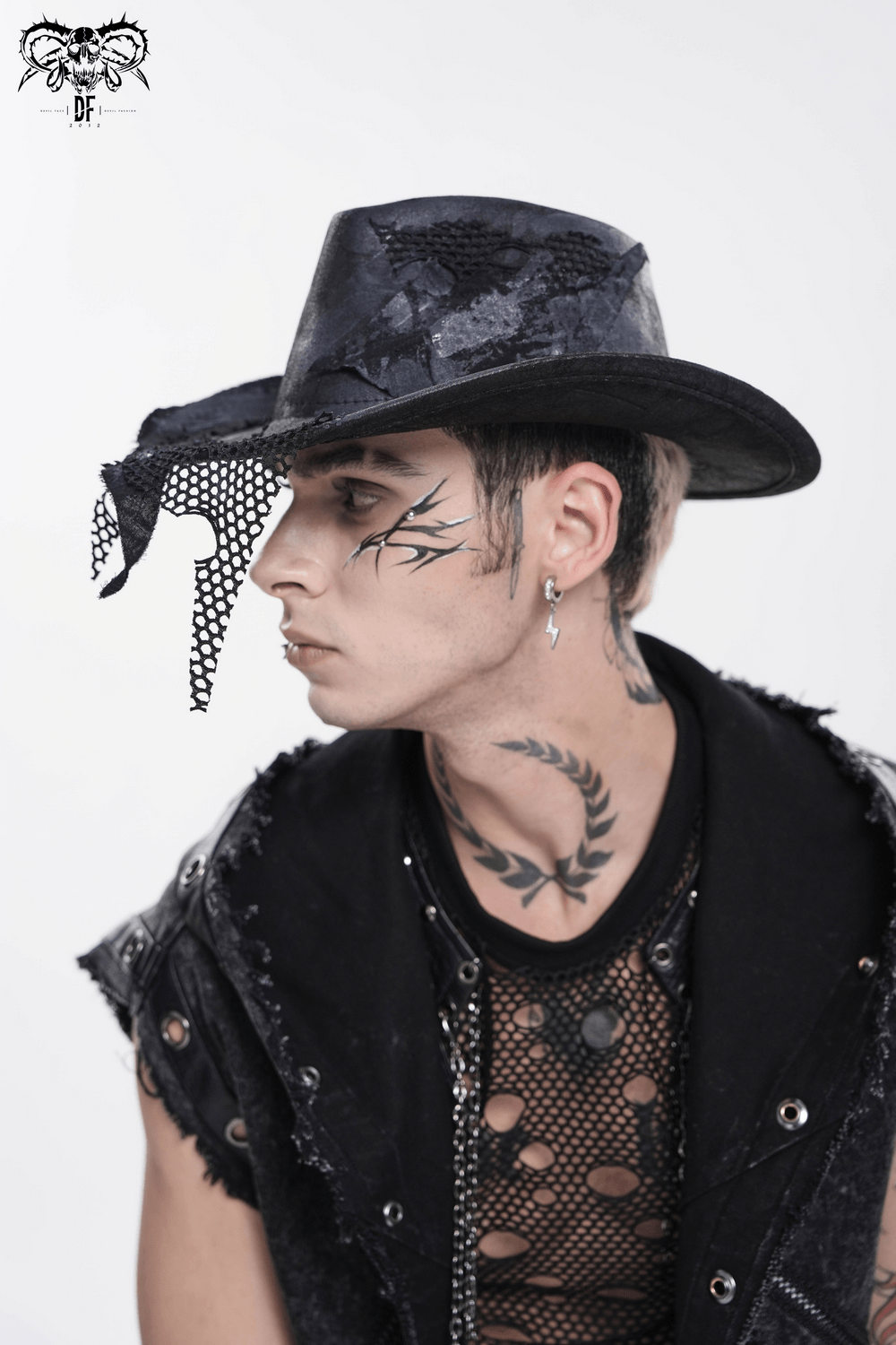 Black Gothic Cowboy Hat with Distressed Mesh Patch Details worn by a model with tattoos.