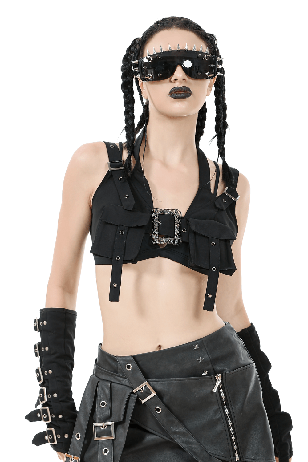 Model wearing a black gothic crop top with buckles, oversized sunglasses, and a punk-inspired outfit.