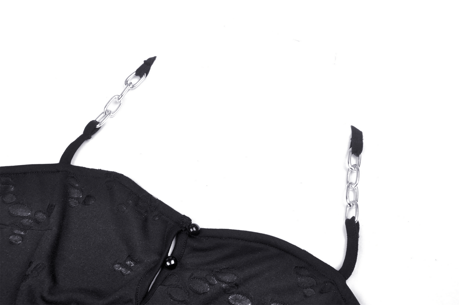 Close-up of black crop top with chain detail straps, showcasing edgy gothic design and soft fabric.