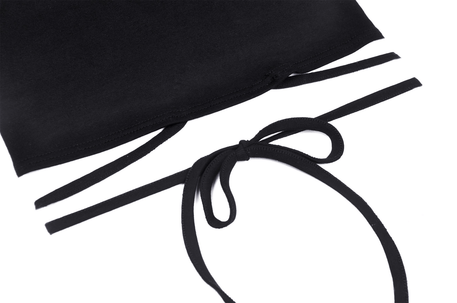 Close-up of black gothic crop top with delicate chain strap details and a stylish bow tie design.