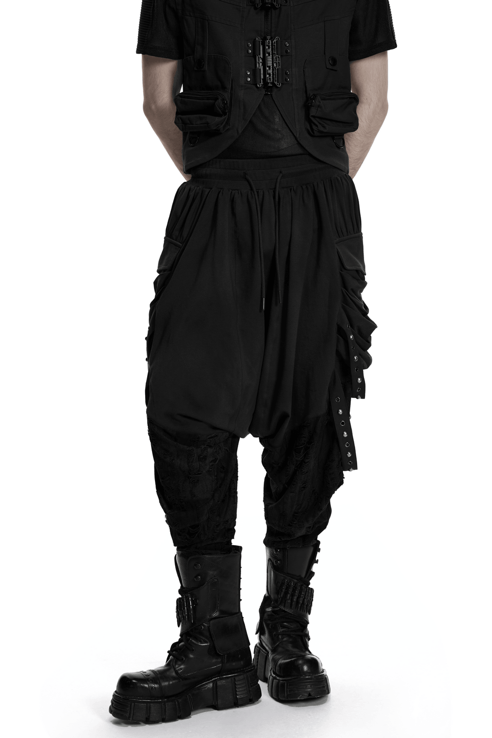 Black Gothic Drop-Crotch Pants with Studded Pockets worn with combat boots and a dark outfit.