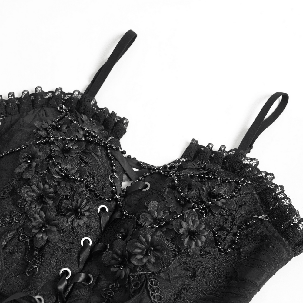 Alt Tag: Black Gothic Floral Lace-Up Corset Bustier Top close-up with floral lace appliques, lace-up front, beaded neckline and straps