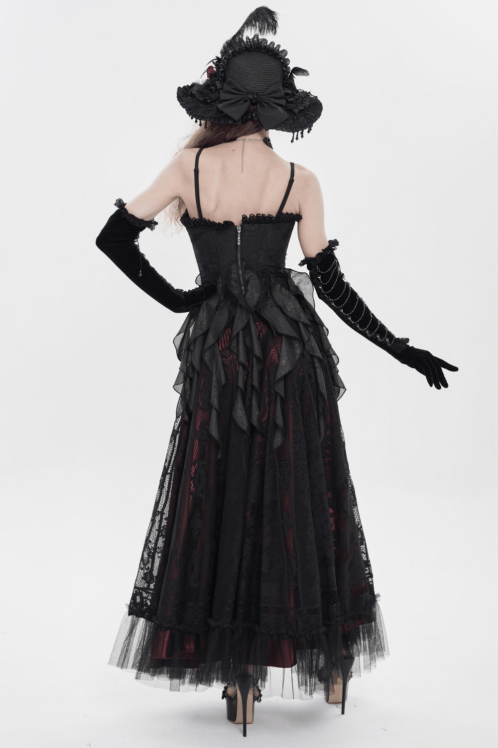 Black Gothic Floral Lace-Up Corset Bustier Top with sheer ruffle handkerchief hem, back view on model in dark romantic festival look