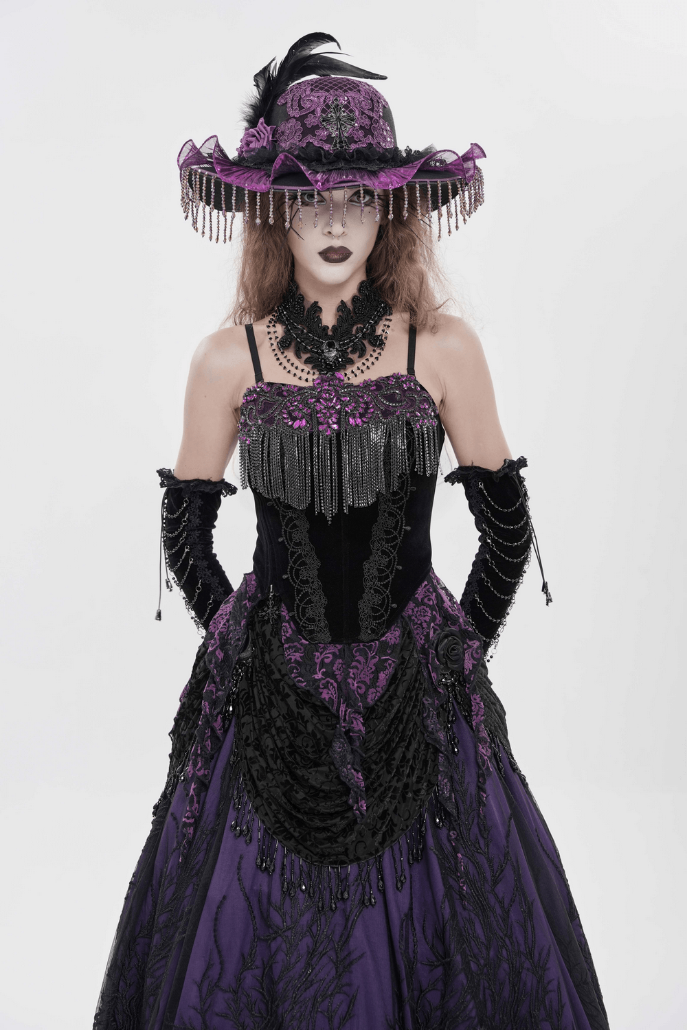 Alt Tag: Black Gothic Fringe Corset Bustier with Purple Lace worn with purple lace, chain fringe trim and dramatic gothic festival look