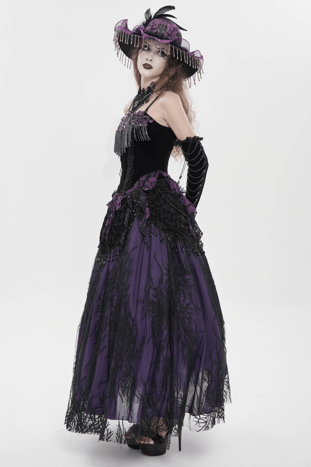 Alt Tag: Black Gothic Fringe Corset Bustier with Purple Lace worn with purple lace skirt, chain fringe trim, festival burlesque look