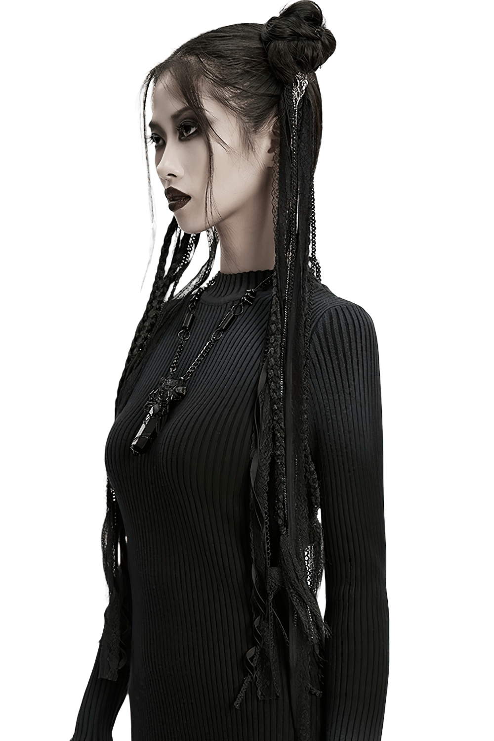 Gothic model showcasing black hair with braided strands and a lace tassel accessory, embodying dark elegance.