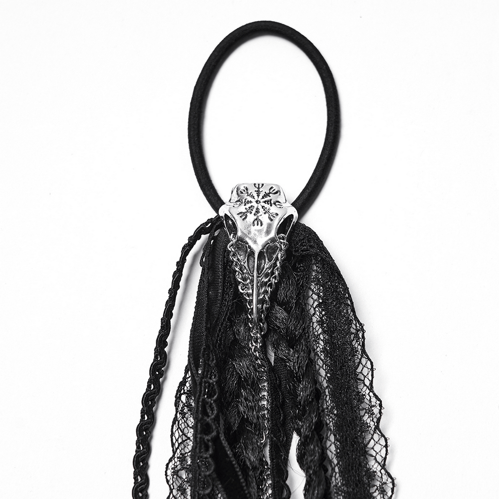 Black Gothic hair tassel with raven skull, lace, and braided strands for a dark, elegant look.