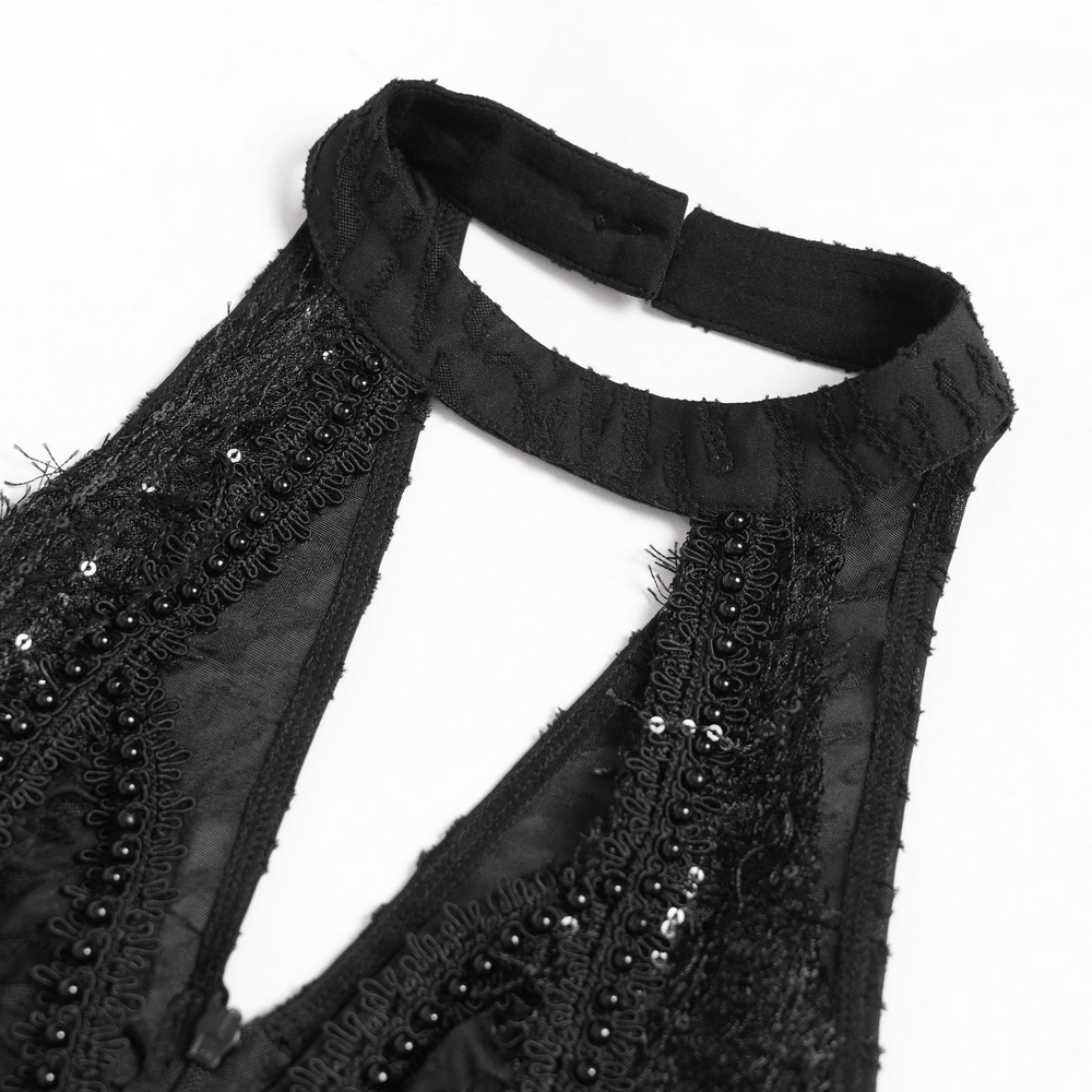 Alt Tag: Black Gothic Halter Neck Top with Asymmetric Hemline, distressed mesh beadwork halter neckline close-up, punk goth sleeveless top