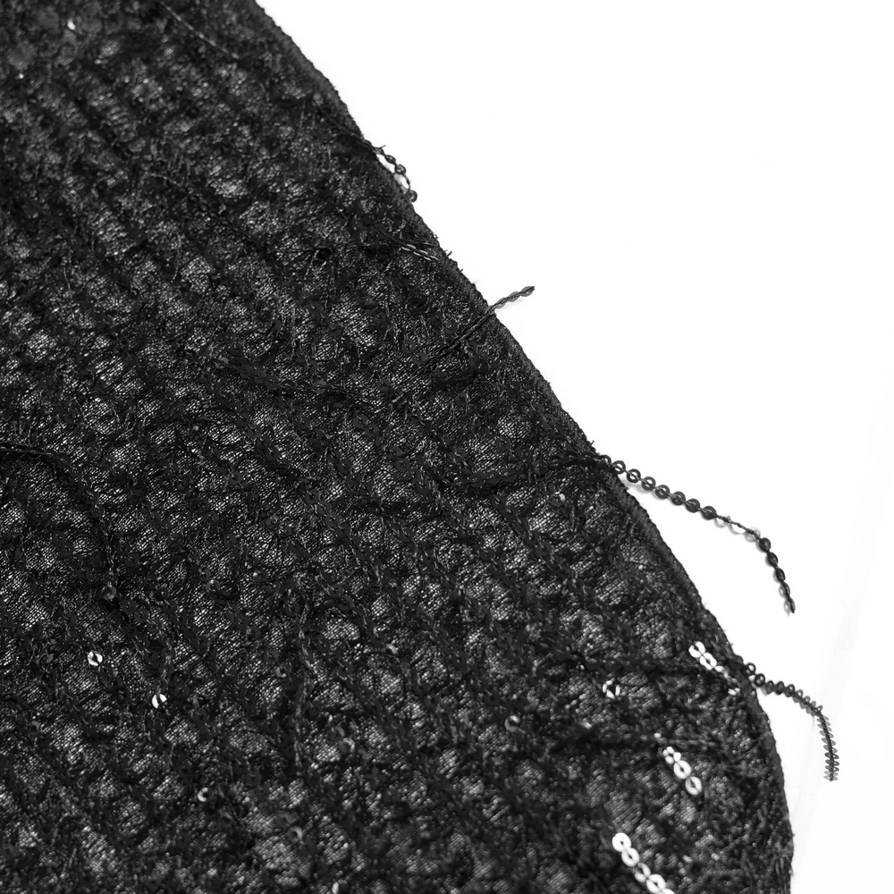 Alt Tag: Black Gothic Halter Neck Top with Asymmetric Hemline close-up of distressed black mesh fabric with beadwork and sequins