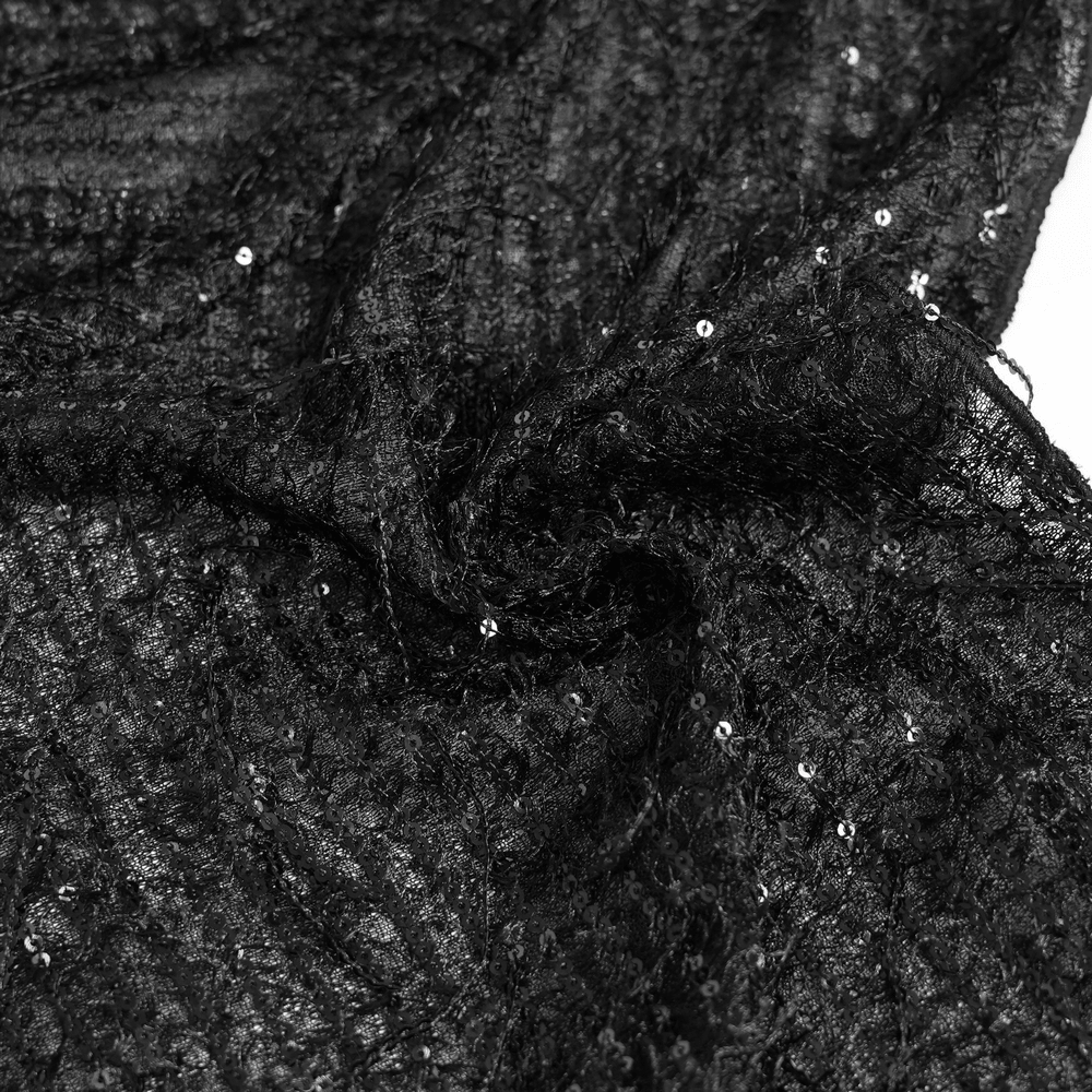 Alt Tag: Black Gothic Halter Neck Top with Asymmetric Hemline close-up of distressed black mesh fabric with bead accents and shredded texture