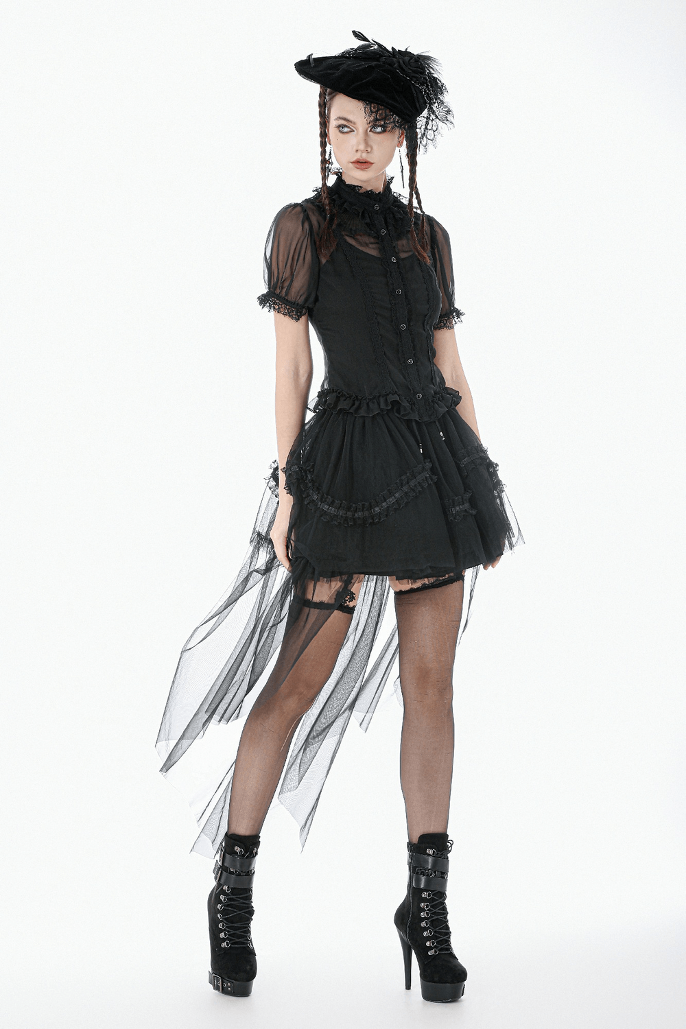 Black Gothic High Low Skirt with Layered Ruffles styled with a dramatic sheer overlay and lace-up boots.
