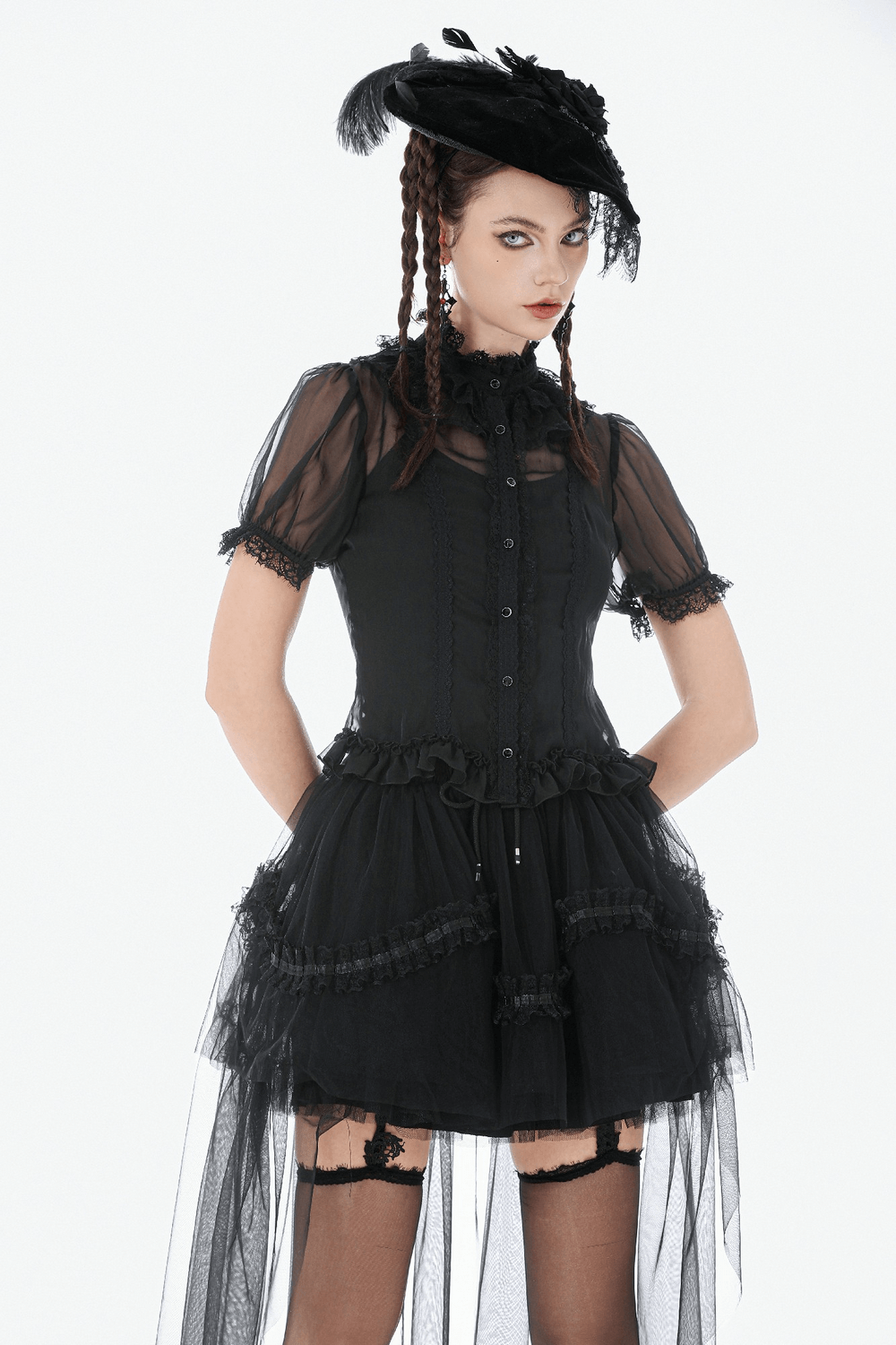 Black Gothic High Low Skirt with Layered Ruffles styled with a sheer top and accessories for a dramatic look.