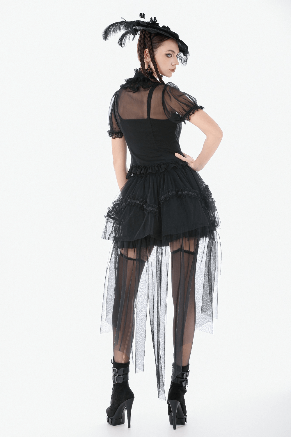 Black Gothic High Low Skirt with Layered Ruffles worn by model from behind, featuring tulle layers and dramatic design.