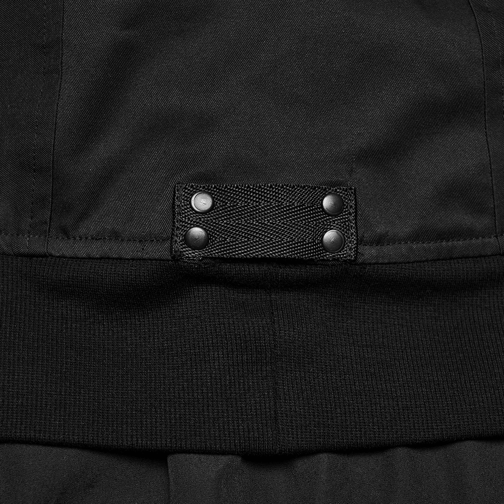 Detail of Black Gothic Hooded Coat with Tactical Strap Details showcasing strap and snap elements.