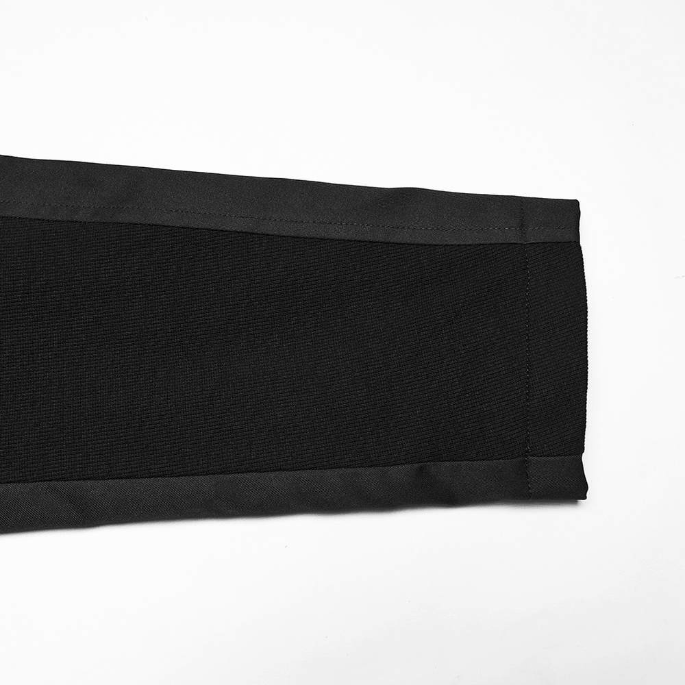 Close-up of the textured fabric detail from the sleeve of the Black Gothic Hooded Coat with Tactical Strap Details.