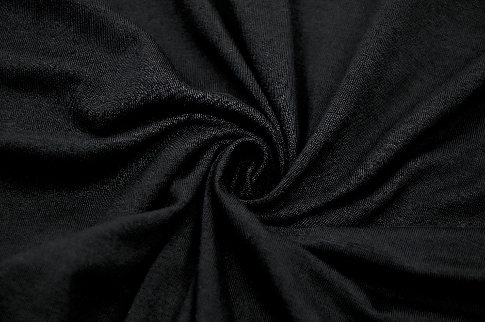 Close-up of soft black fabric, ideal for creating edgy Gothic fashion pieces.