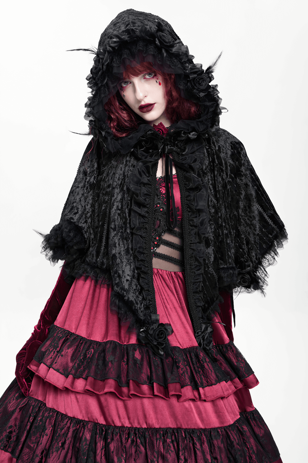 Black Gothic Hooded Lace Cape with Rose Details worn by a model showcasing Victorian-inspired elegance.