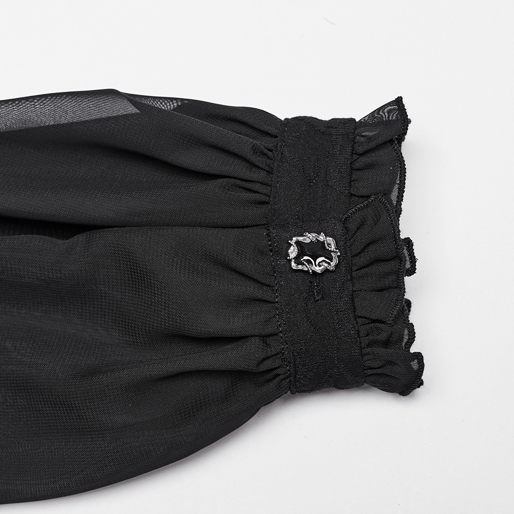 Detail shot of black chiffon sleeve with ruffled lace and Gothic metal clasp, highlighting elegance and style.