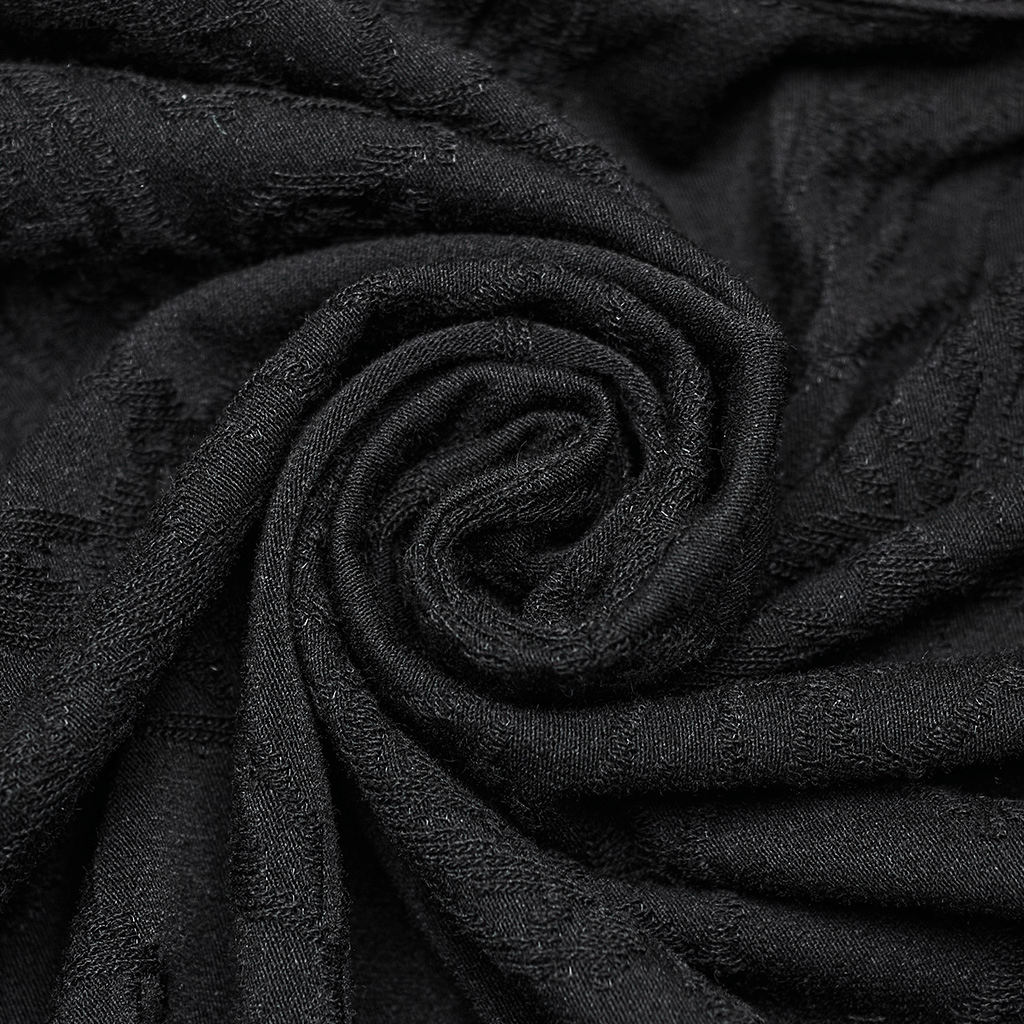 Close-up of black floral textured fabric, perfect for a Gothic lace blouse with elegant designs.
