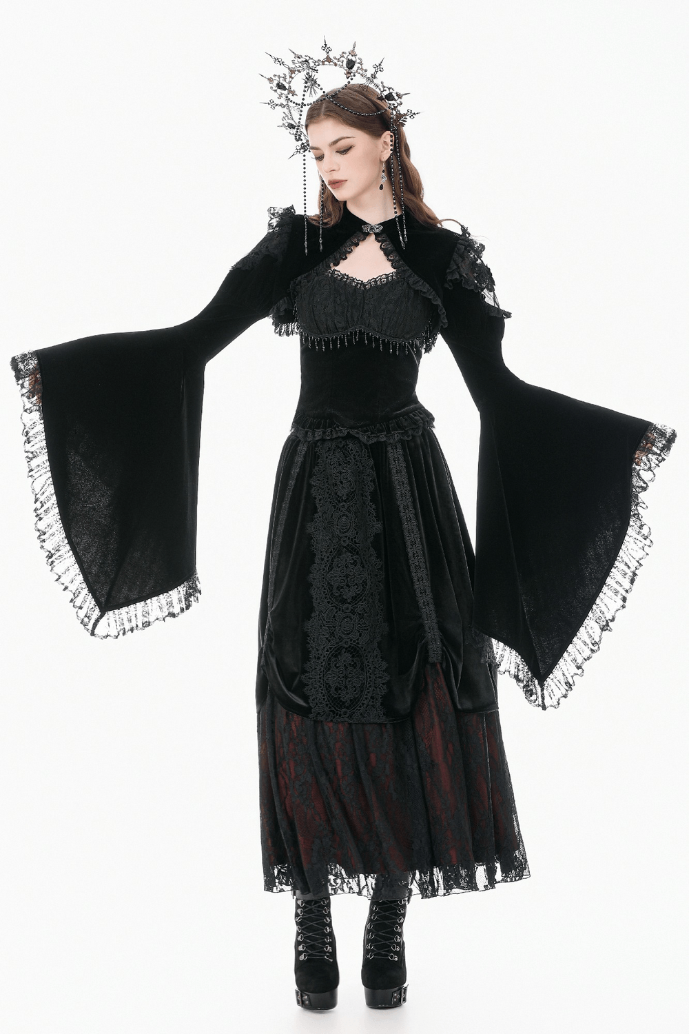 Black Gothic Lace Bolero Shrug with Bell Sleeves worn by a model showcasing a dramatic cape collar and flared bell sleeves.
