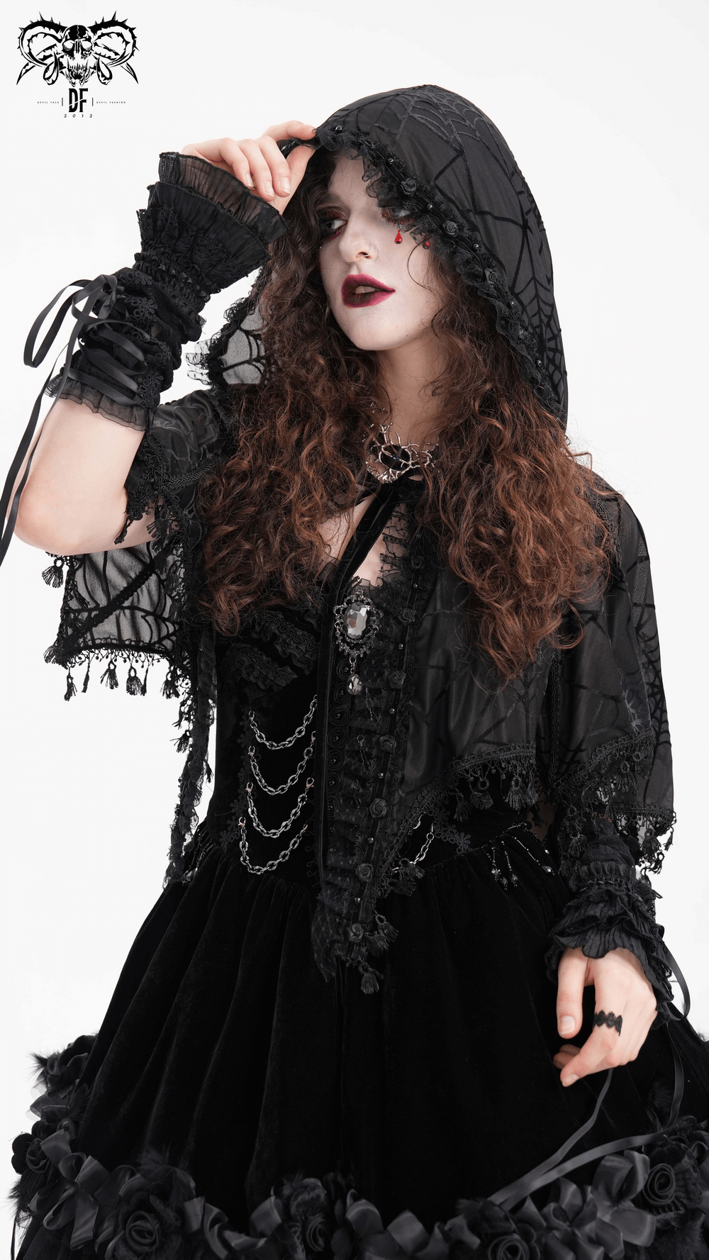 Black gothic lace cape with hood and tassels, featuring a spiderweb pattern—perfect for dark, elegant fashion.