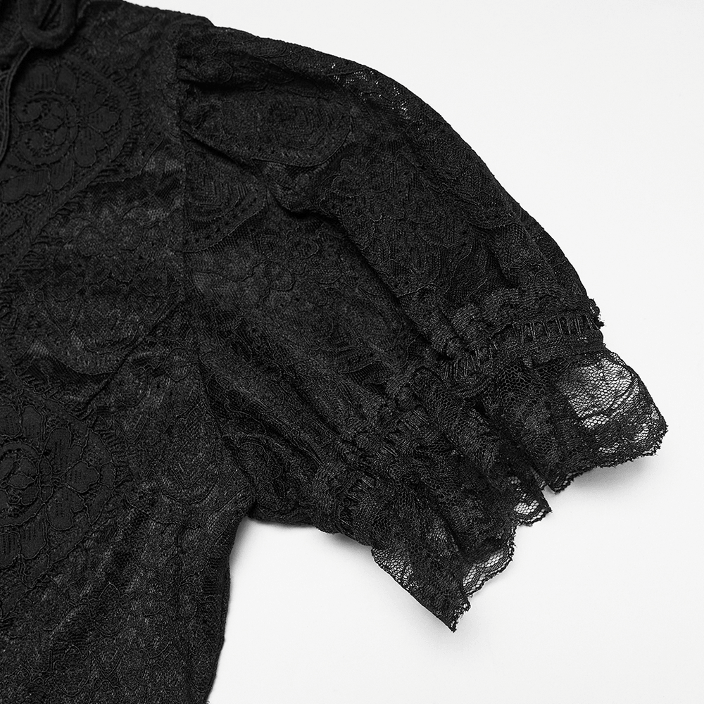 Alt Tag: Black Gothic Lace Corset Blouse with Puff Sleeves close-up of sheer floral lace puff sleeve with ruffled trim