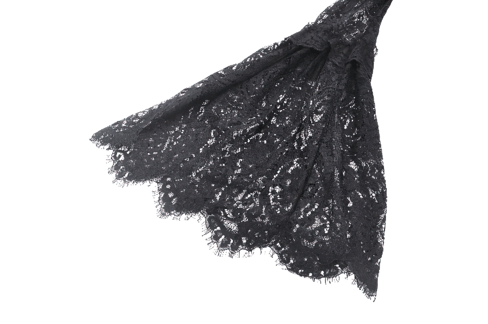 Black lace fabric showcasing intricate patterns, perfect for gothic fashion and elegant designs.