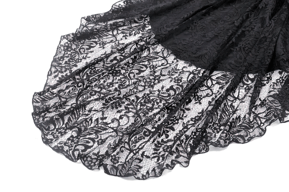 Close-up of intricate black lace fabric showcasing floral patterns and scalloped edges for a gothic touch.