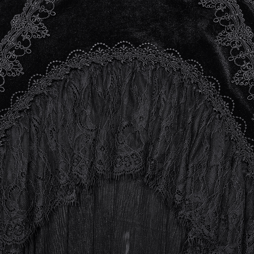 Close-up of black velvet fabric with intricate lace detailing on a gothic fishtail skirt.