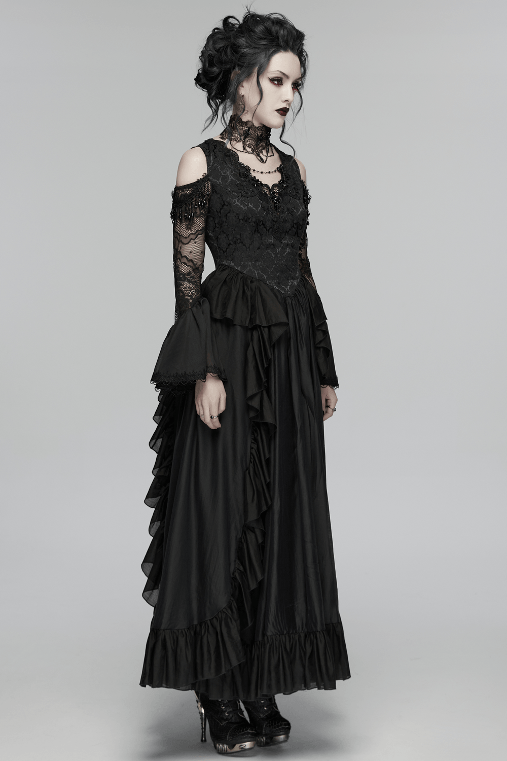 Alt Tag: Black Gothic Lace Maxi Dress with Ruffle Sleeves in black lace with ruffle skirt, sheer sleeves and gothic bodice details