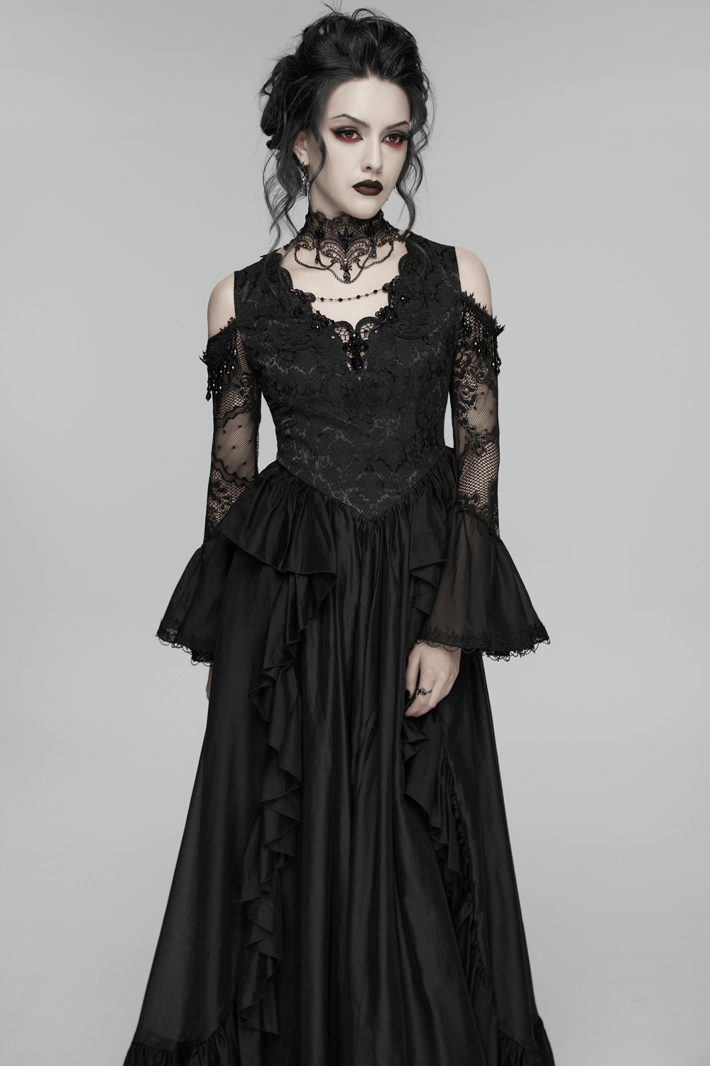 Alt Tag: Black Gothic Lace Maxi Dress with Ruffle Sleeves featuring sheer lace sleeves, flared cuffs, layered ruffle skirt and crystal pendant detail