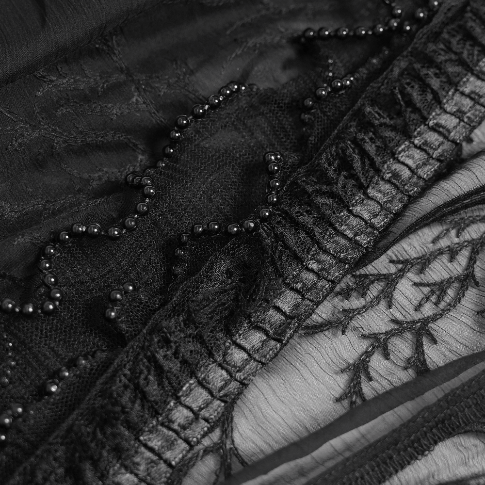 Alt Tag: Black Gothic Lace Mesh Maxi Dress with Short Sleeves close-up of sheer lace mesh, beaded trim, and ruffled stitching