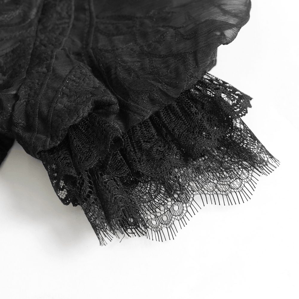 Alt Tag: Black Gothic Lace Mesh Maxi Dress with Short Sleeves close-up of sheer lace mesh ruffle hem, Victorian gothic drama in black