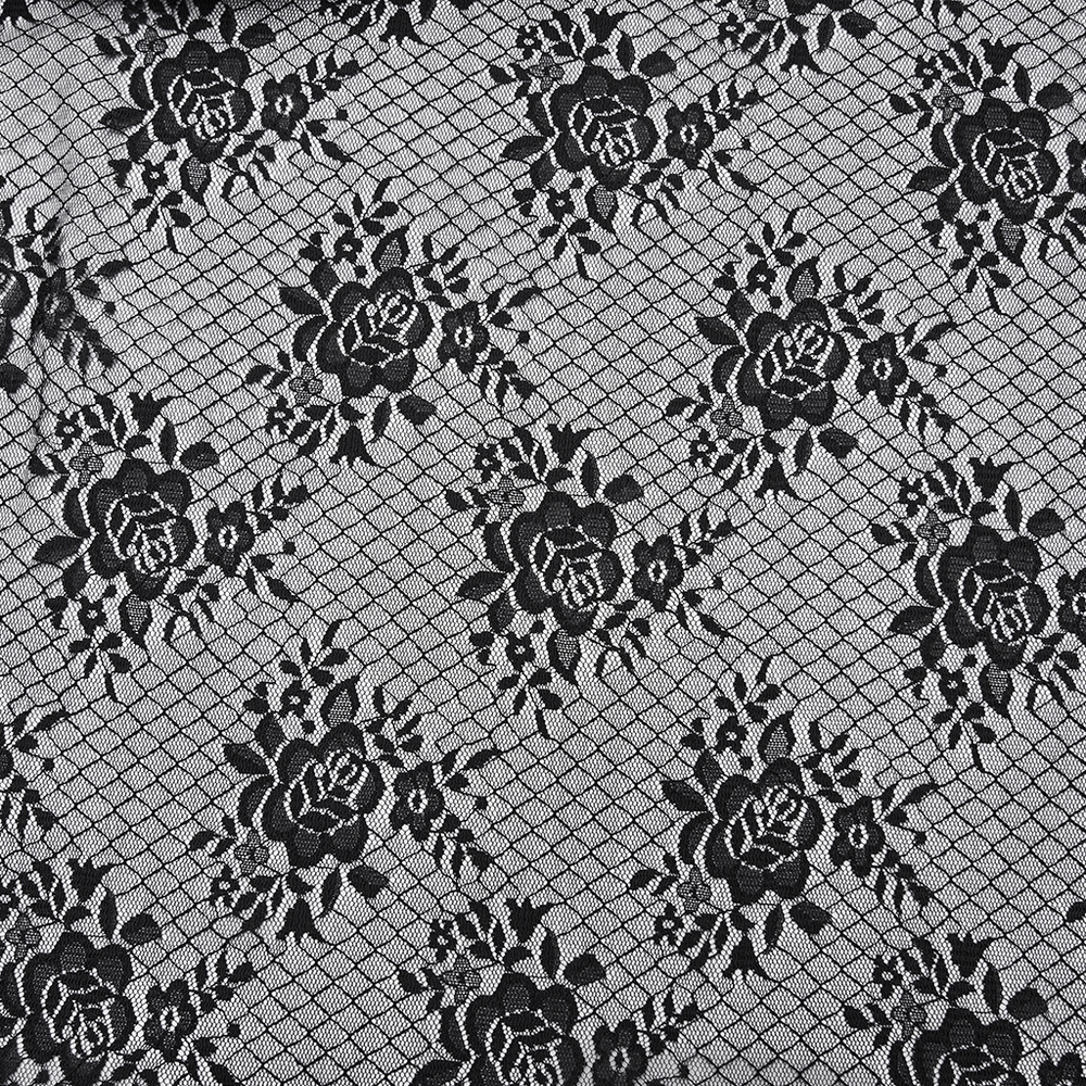 Black Gothic Lace Shorts with High-Low Ruffled Hem floral lace fabric pattern with intricate rose designs.