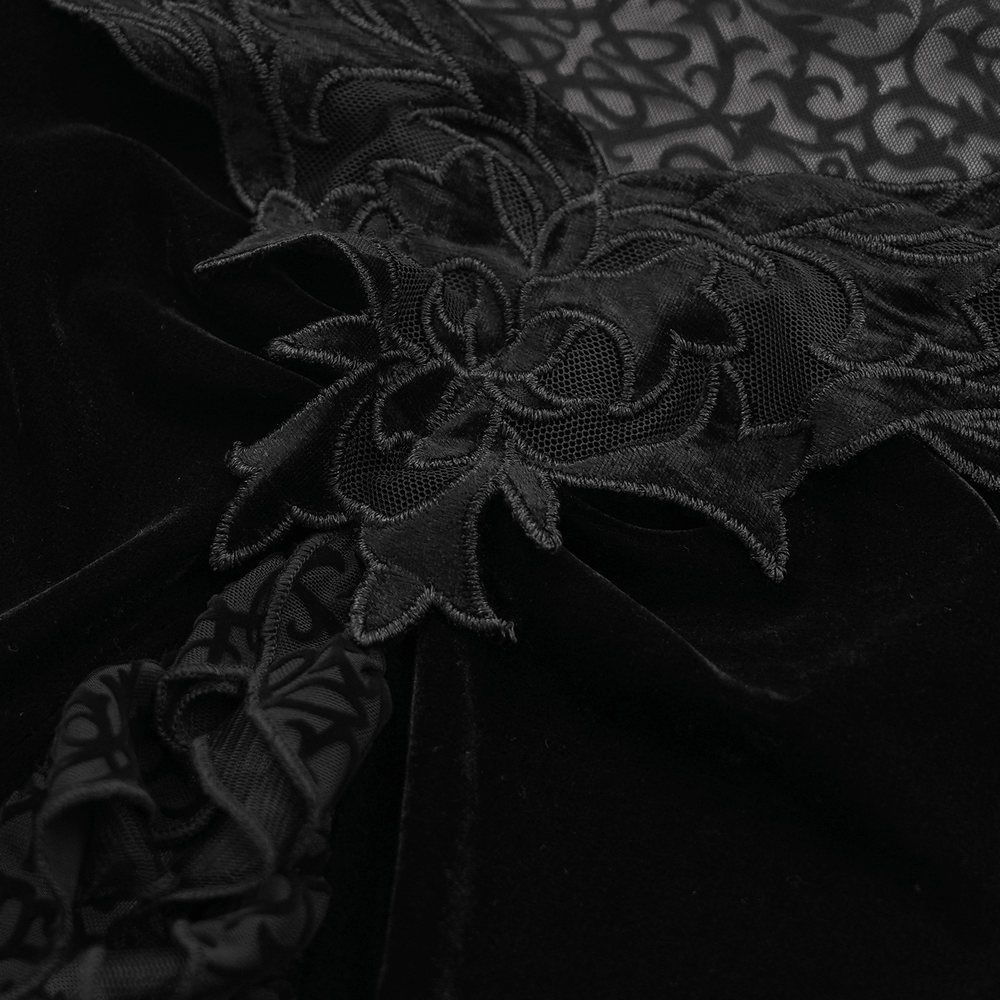 Close-up of black gothic lace top featuring floral applique and intricate mesh details.