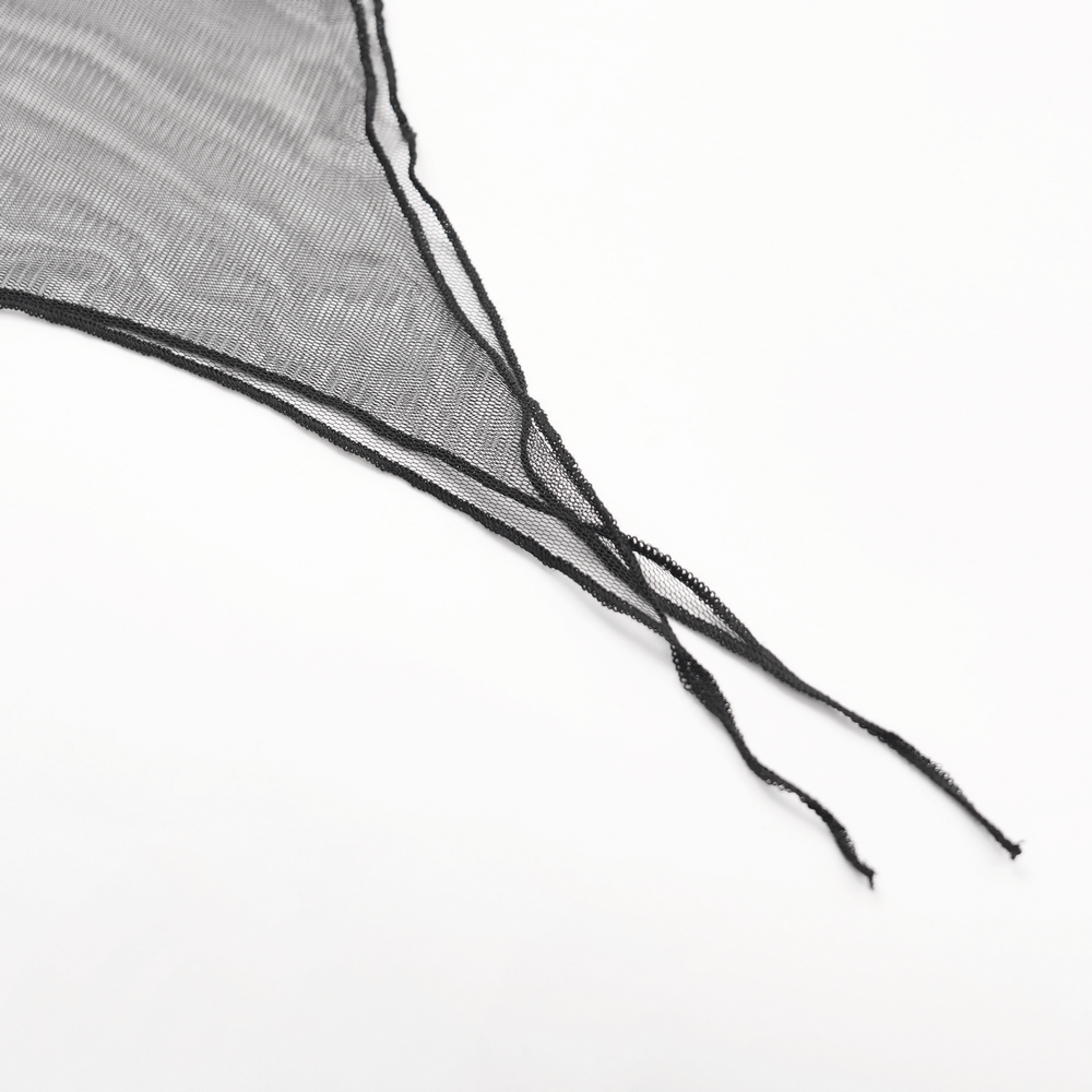 Close-up of delicate black mesh fabric with intricate strands for gothic fashion.