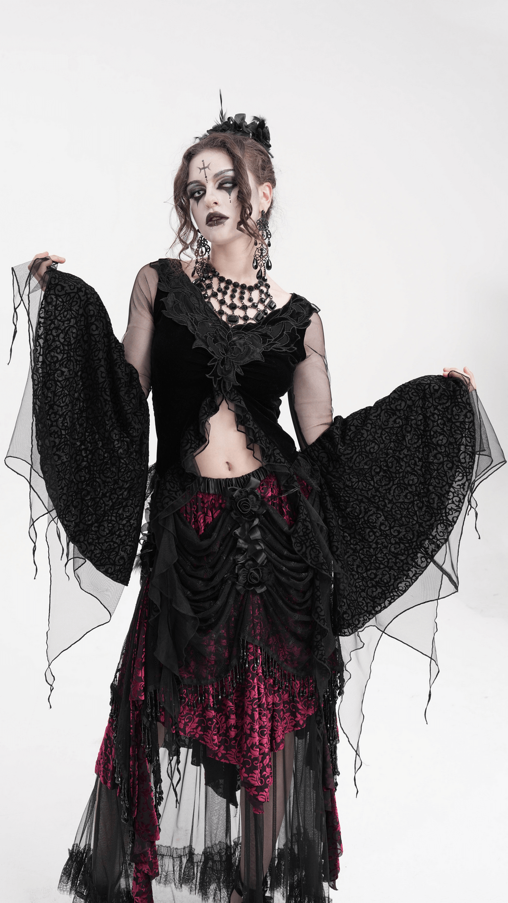 Black gothic lace top with mesh sleeves, floral details, and layered skirt, perfect for dark fantasy fashion.