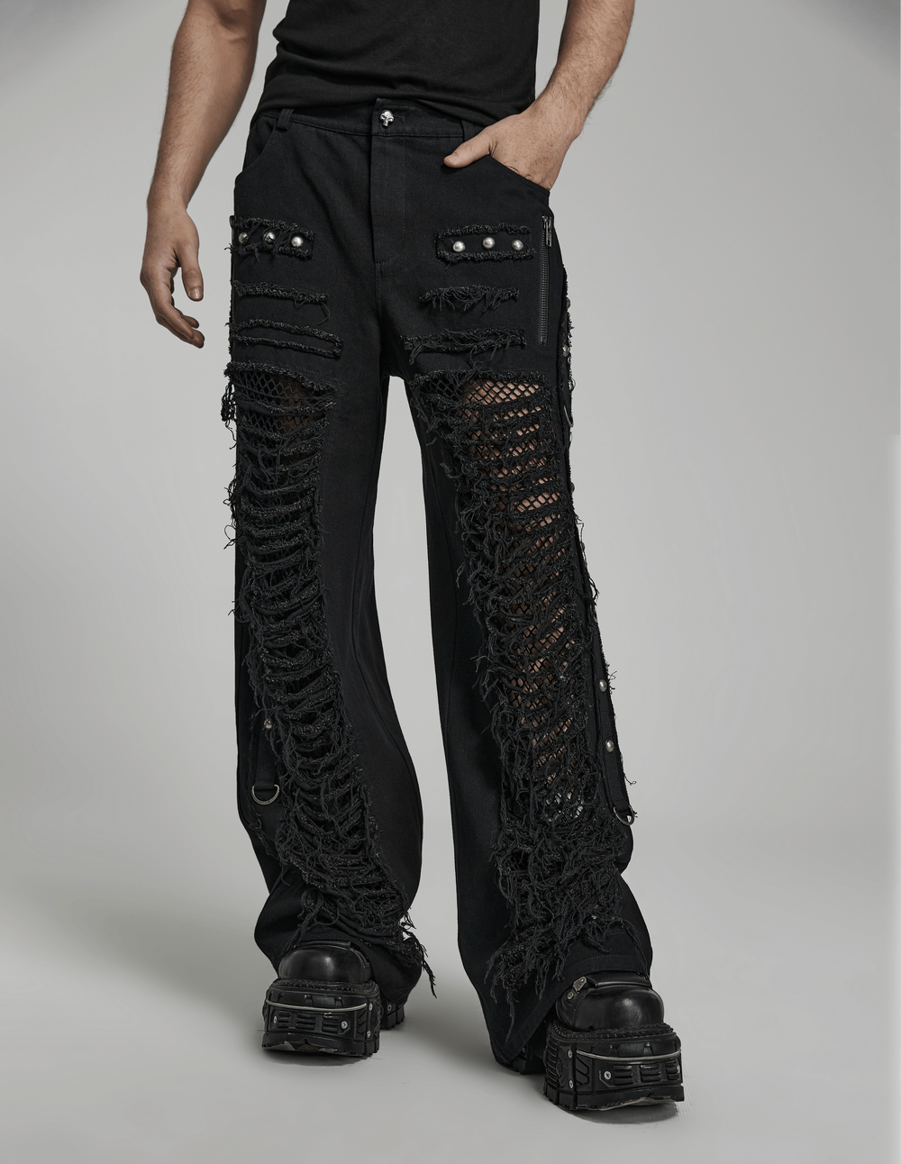 Black gothic ripped cargo pants for men with edgy chain details and rugged texture.