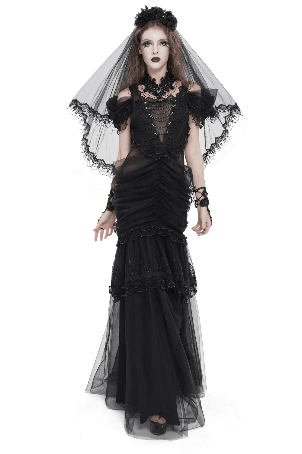 Black Gothic Lace-Up Dress with Ruffled Tulle and Roses worn by a model, featuring elegant lace and tulle details.
