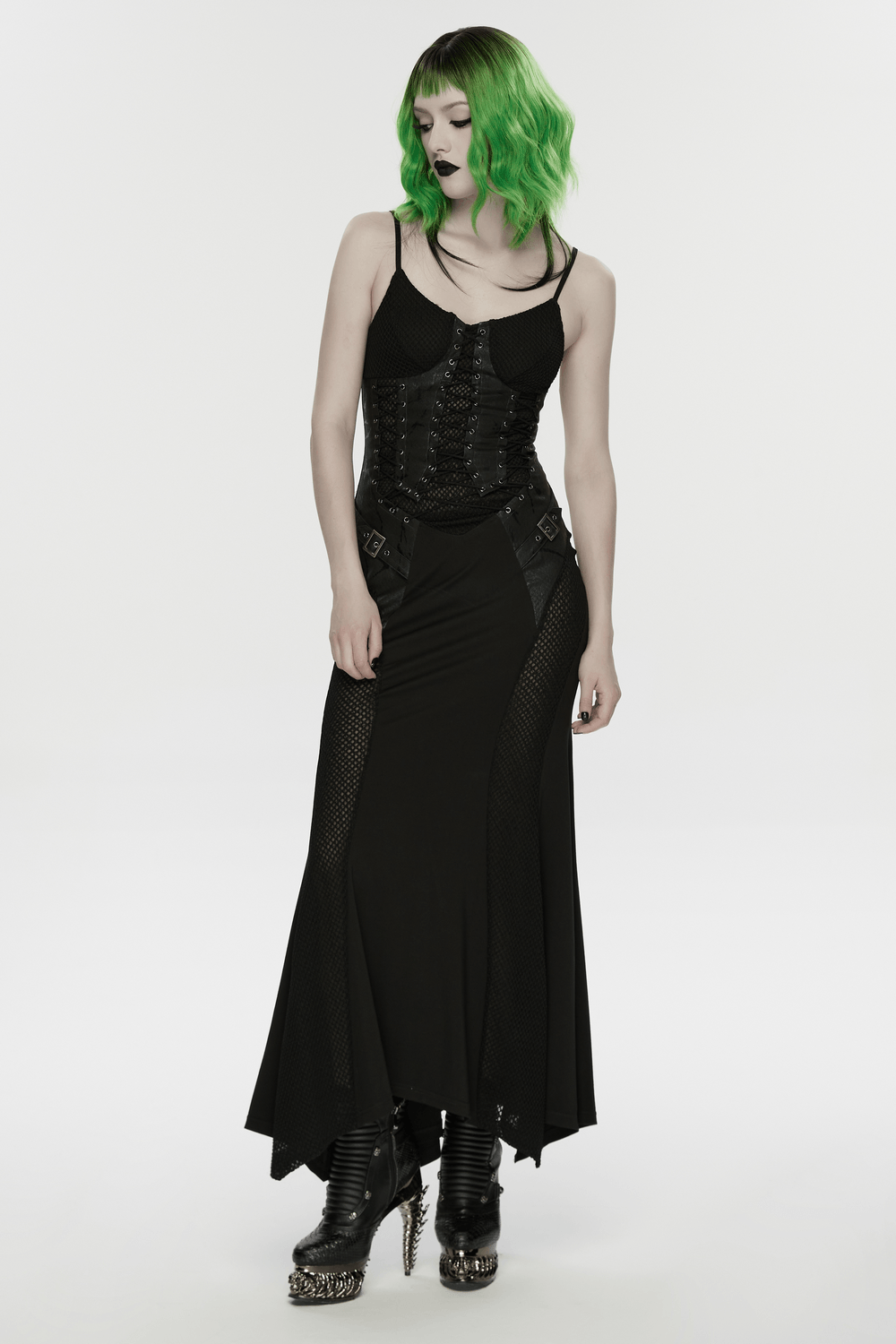 Black Gothic Lace-Up Mermaid Fishnet Maxi Dress on model, corset lace-up bodice, fishnet mesh panels, irregular hem, punk goth maxi