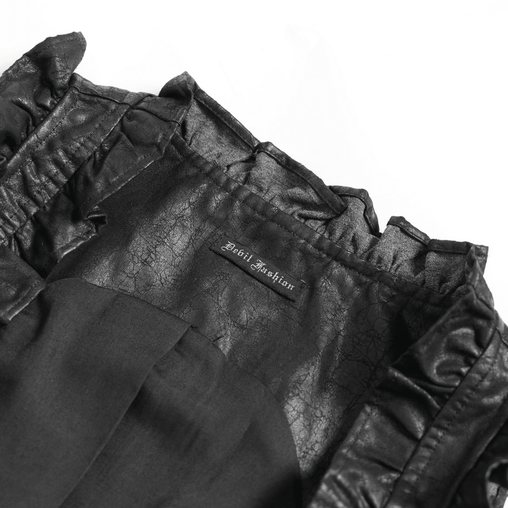 Black Gothic Lace Up Ruffle Waistcoat for Women interior view showcasing dark faux leather fabric and ruffle details.