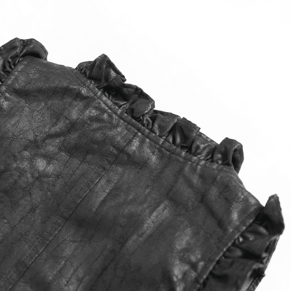 Close-up of the ruffled trim on the Black Gothic Lace Up Ruffle Waistcoat for Women made from dark faux leather.