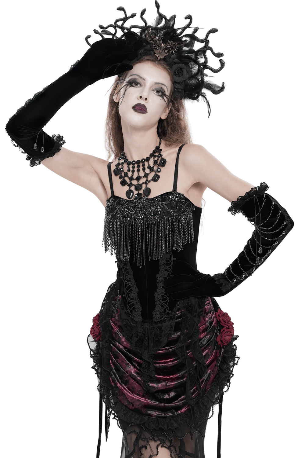 Alt Tag: Black Gothic Lace-Up Velvet Fringe Corset Top on model with fringe bust, lace-up detail, long gloves, dramatic gothic headpiece