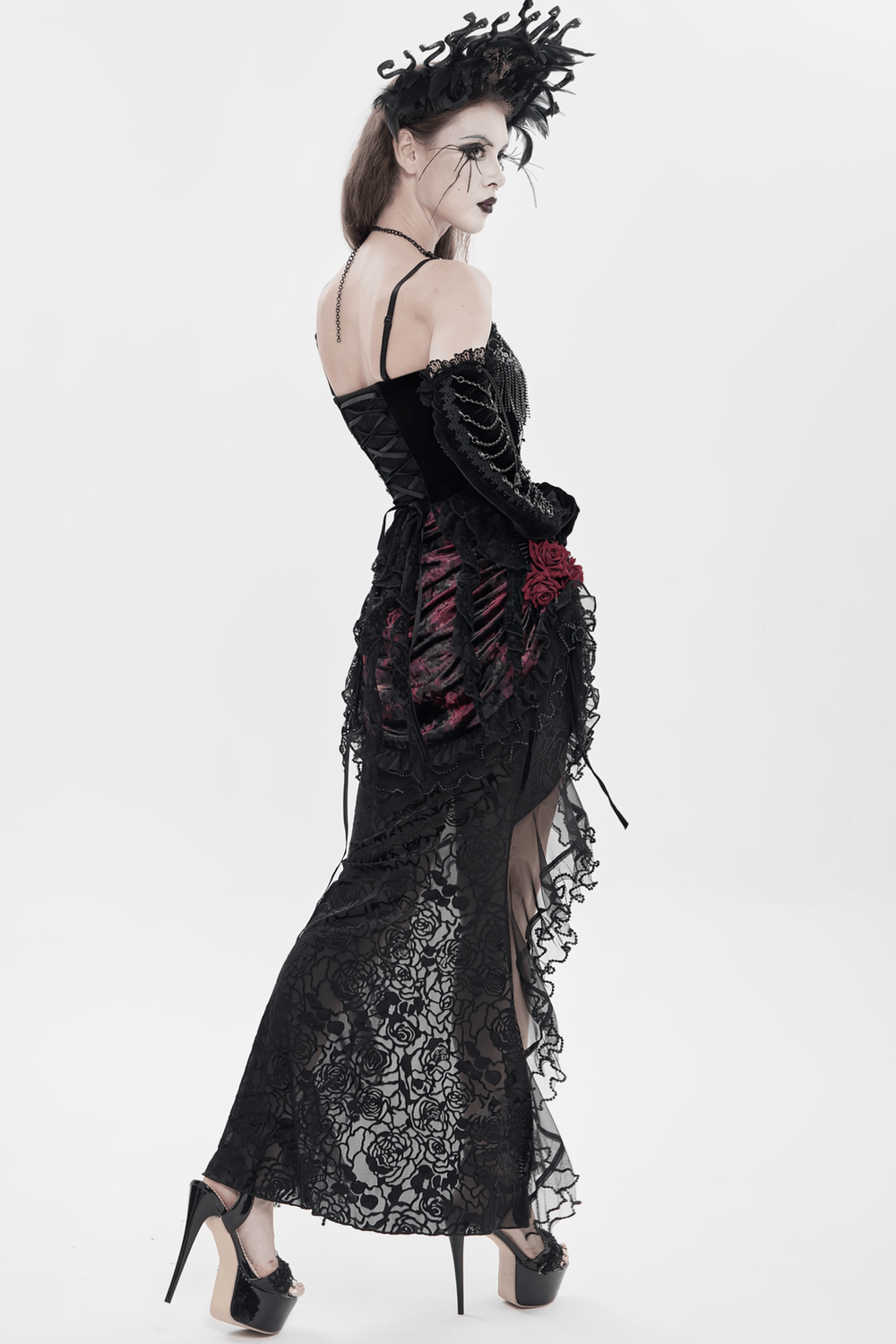 Alt Tag: Black Gothic Lace-Up Velvet Fringe Corset Top styled with lace gothic gown, dramatic headpiece, and high heels — dark romance vibes
