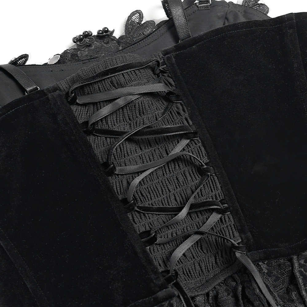 Alt Tag: Black Gothic Lace-Up Velvet Fringe Corset Top close-up of black velvet panel with lace-up front and gothic lace trim